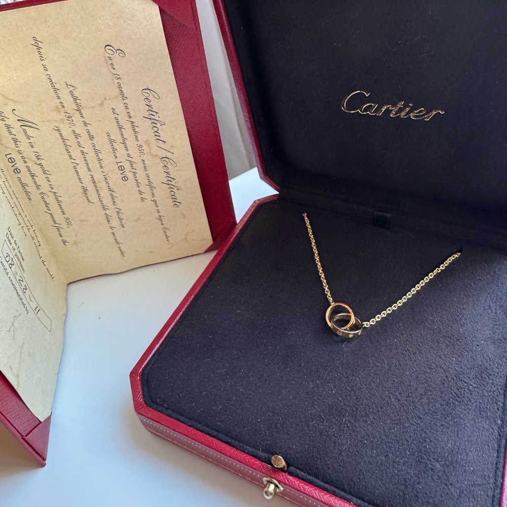 Authentic cartier interlocking love necklace, Yellow Gold , Box And COA